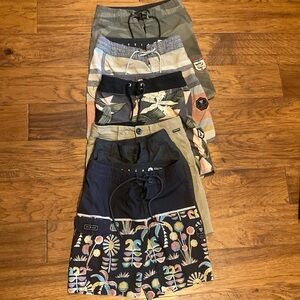 6 pairs of Boys Size 22 shorts- 2 walking short and 4 boardshorts.